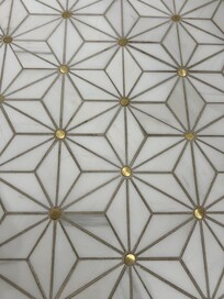 The coolest, marble, three dimensional tile in the primary bathroom!