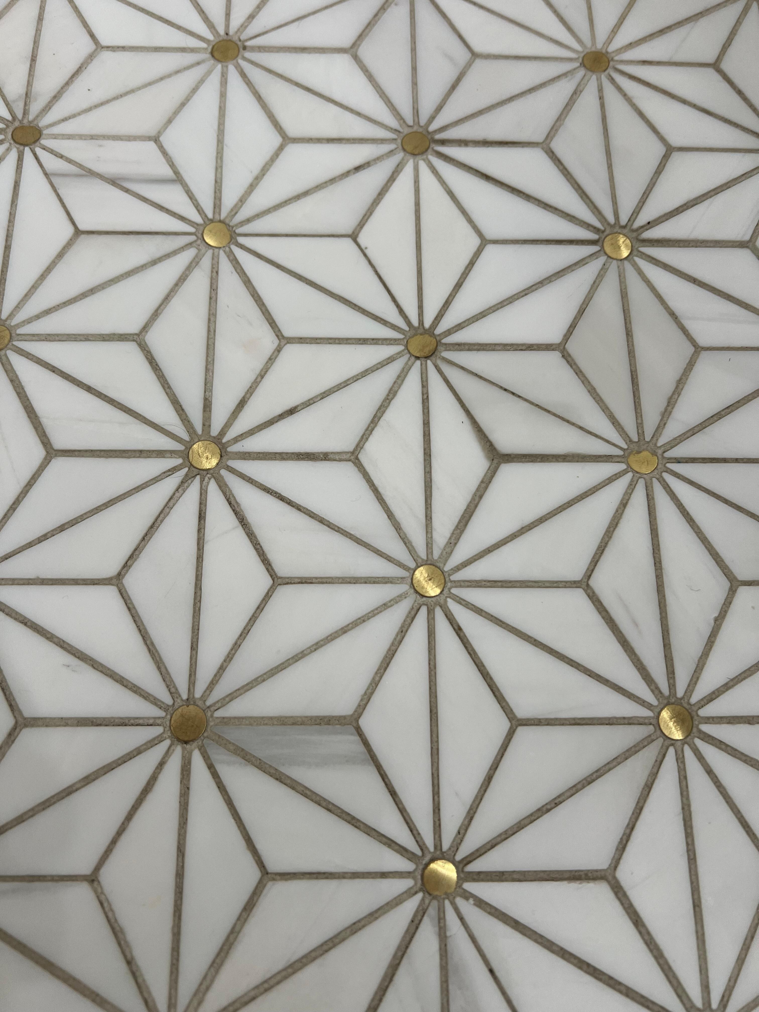 The coolest, marble, three dimensional tile in the primary bathroom!