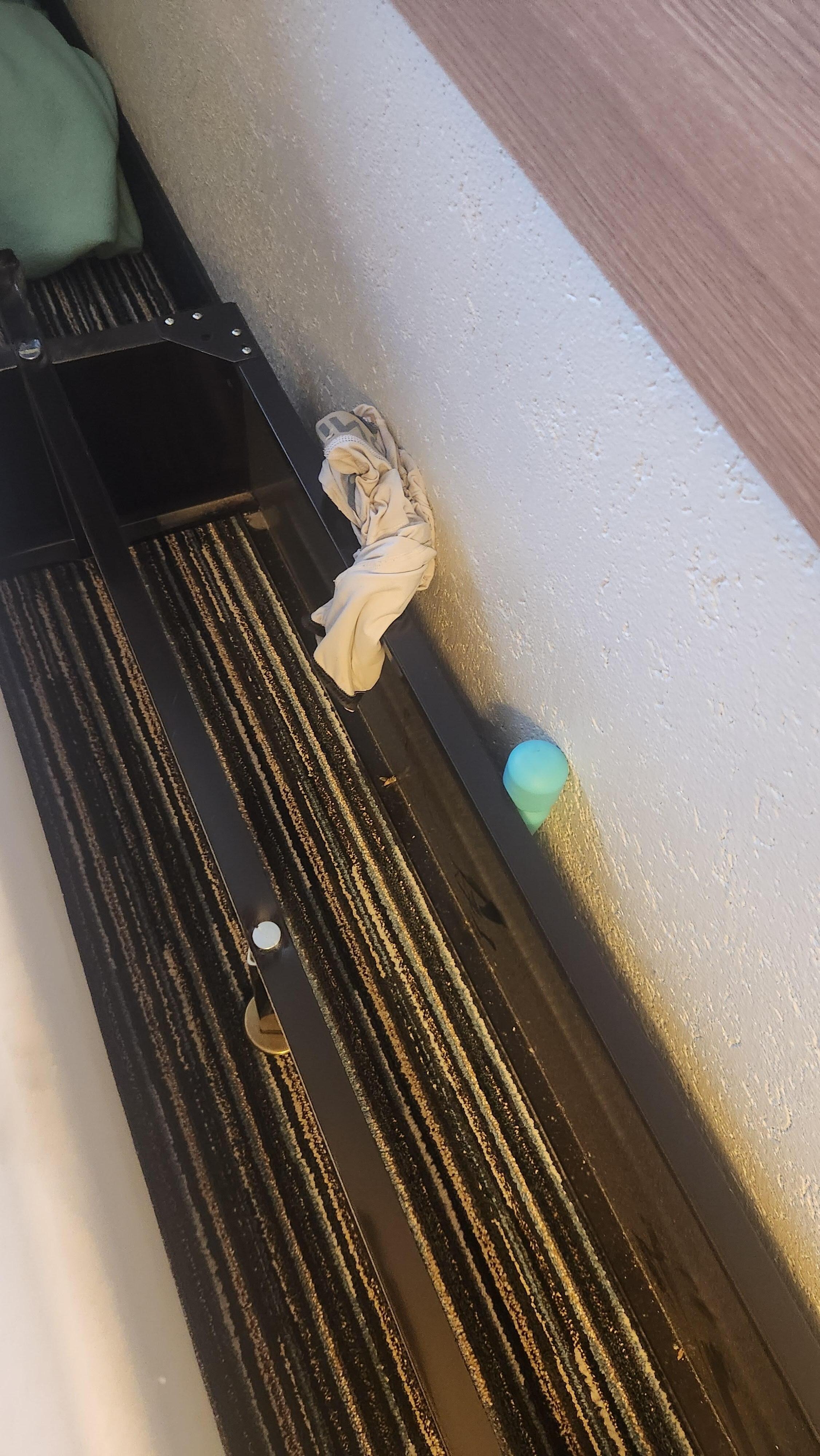 Behind the bed