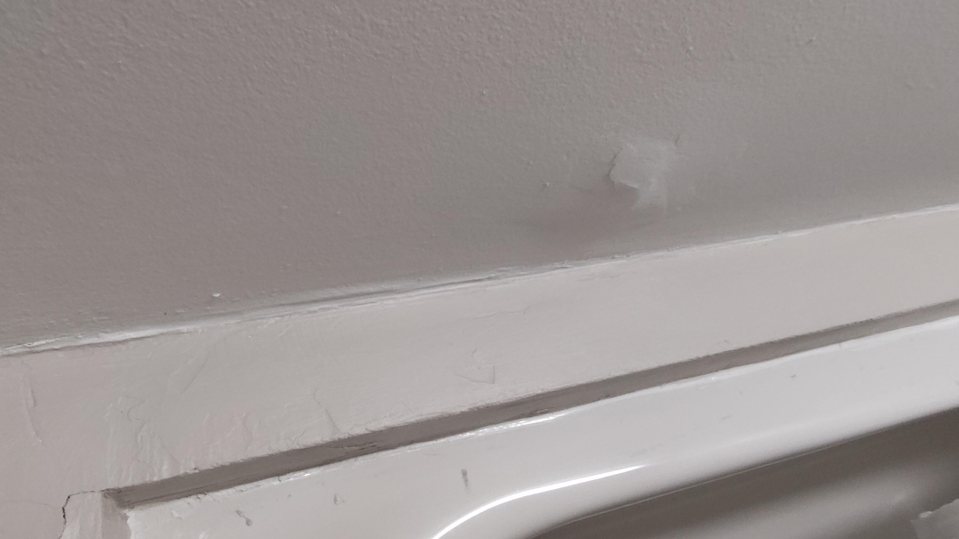 Ceiling in bathroom has water damage from room above 