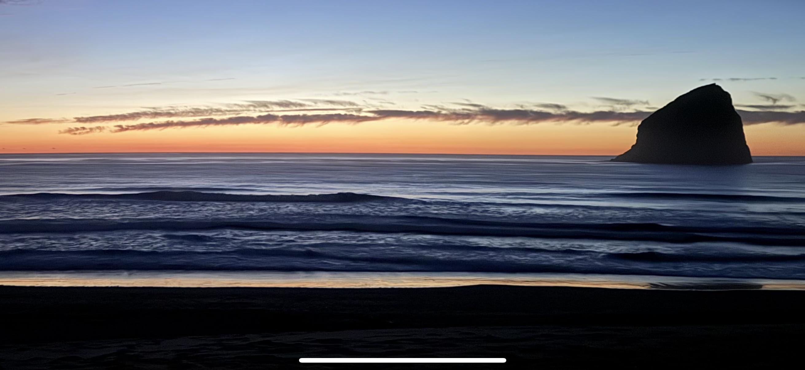 Sunset day 2. Amazing colors and access to this view while you sit at the table inside or open tithe door and step onto the beach. Loved this place! 