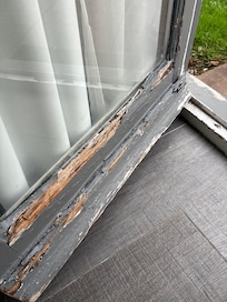 Rotting doorframes which let cold and damp into room