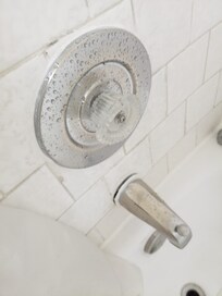 Loose spout and hot and cold not marked.