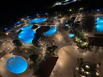 Nighttime view of the pools.