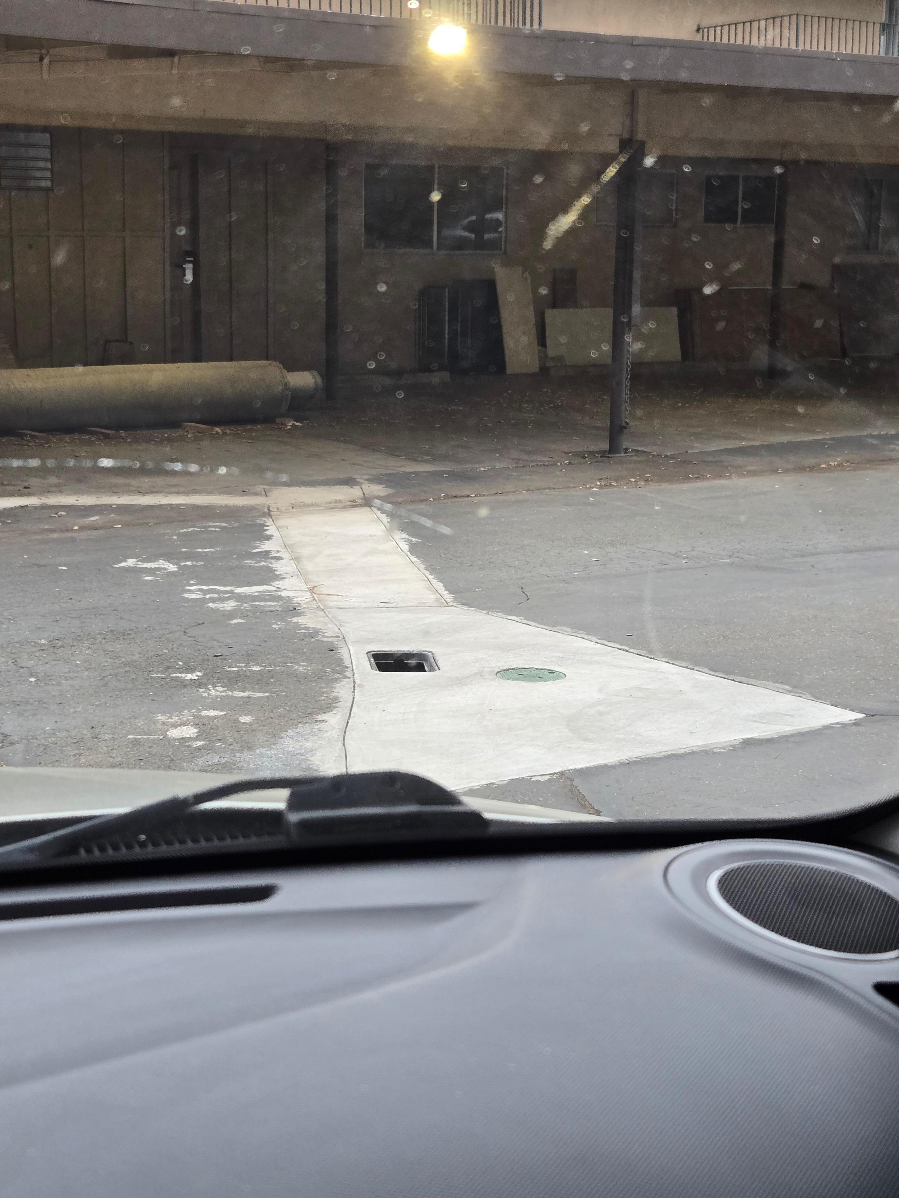 Junk in parking spots and open/uncovered utility box