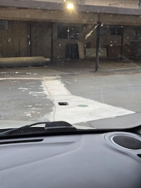 Junk in parking spots and open/uncovered utility box