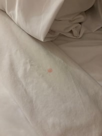 Stained bed sheet