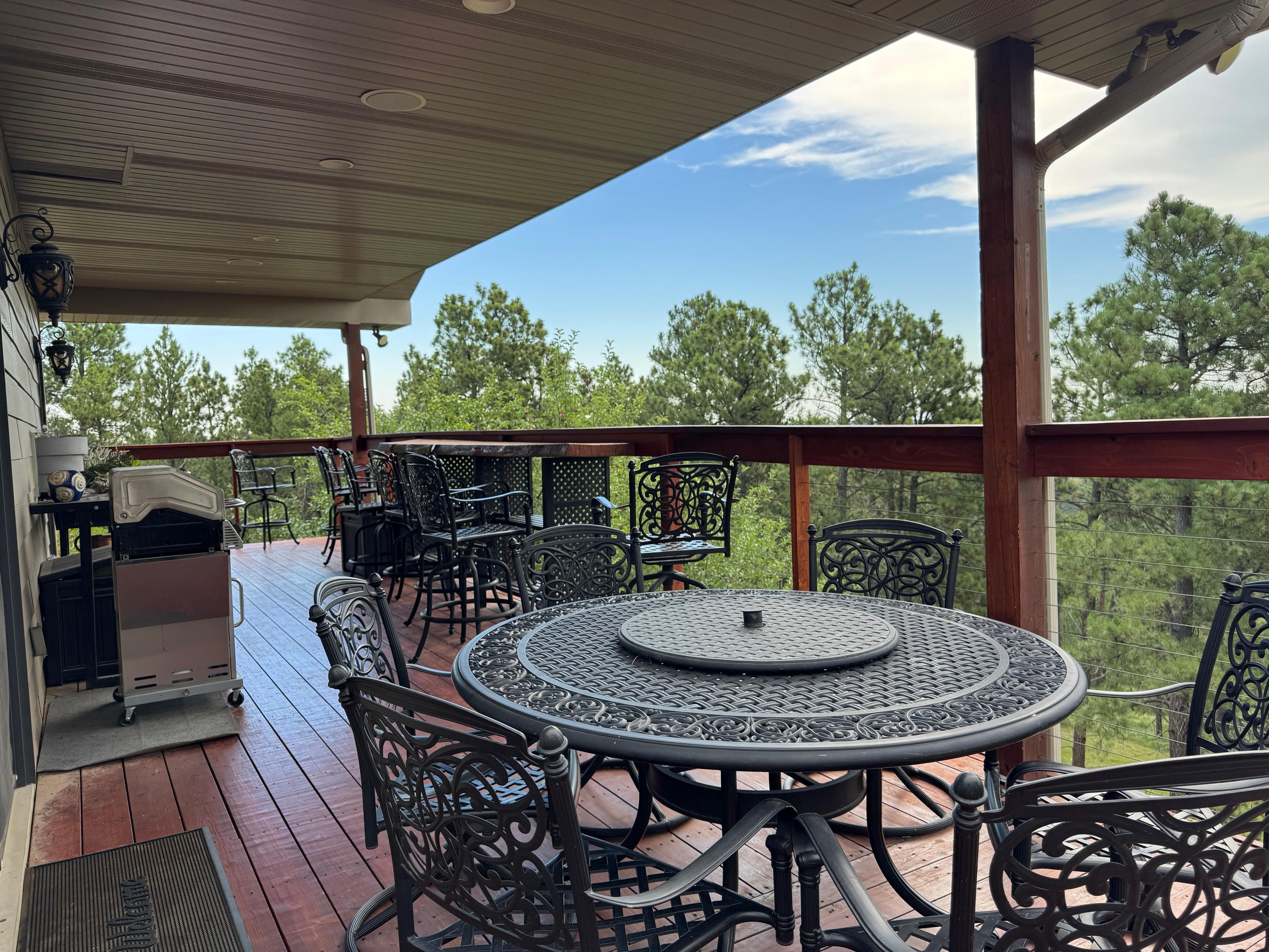 Porch with plenty of seating for entire family to enjoy the views and perfect weather.