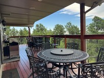 Porch with plenty of seating for entire family to enjoy the views and perfect weather.