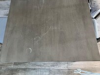Scratched and water stained table top