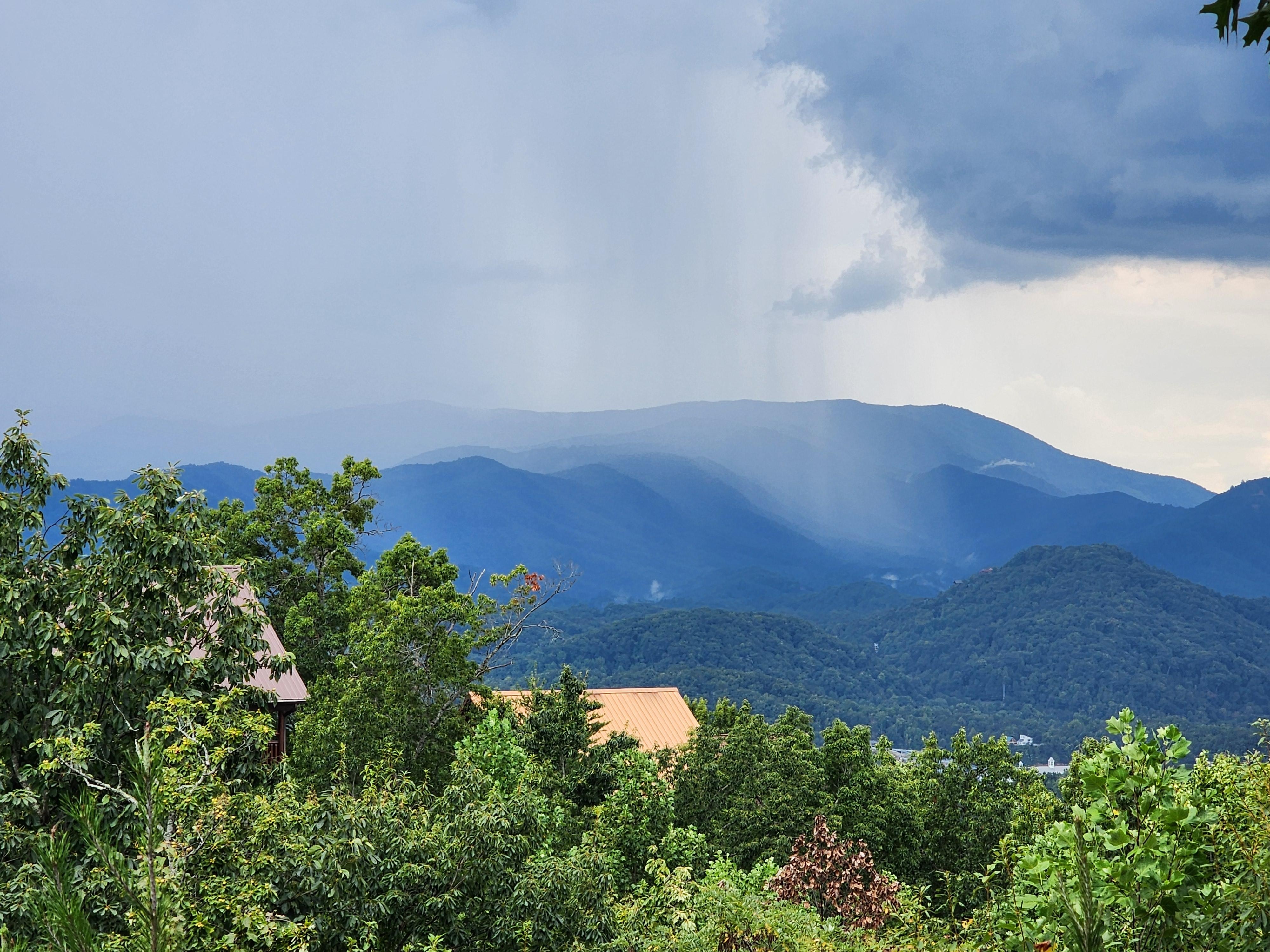 We got to watch a rain storm come across the mountains from the deck.