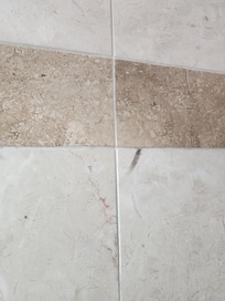 Black smudges all over in shower