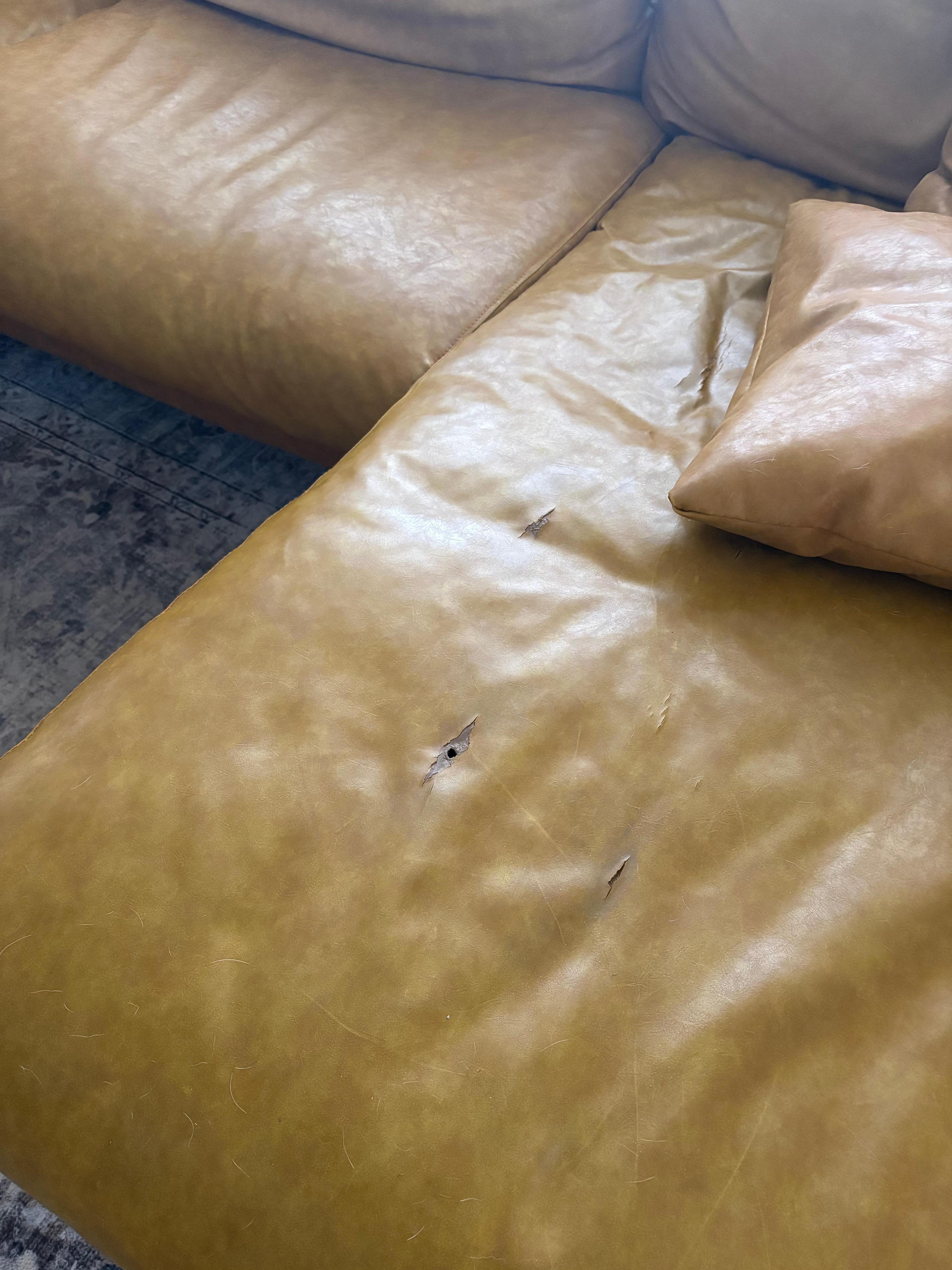 Couch dirty torn leather 