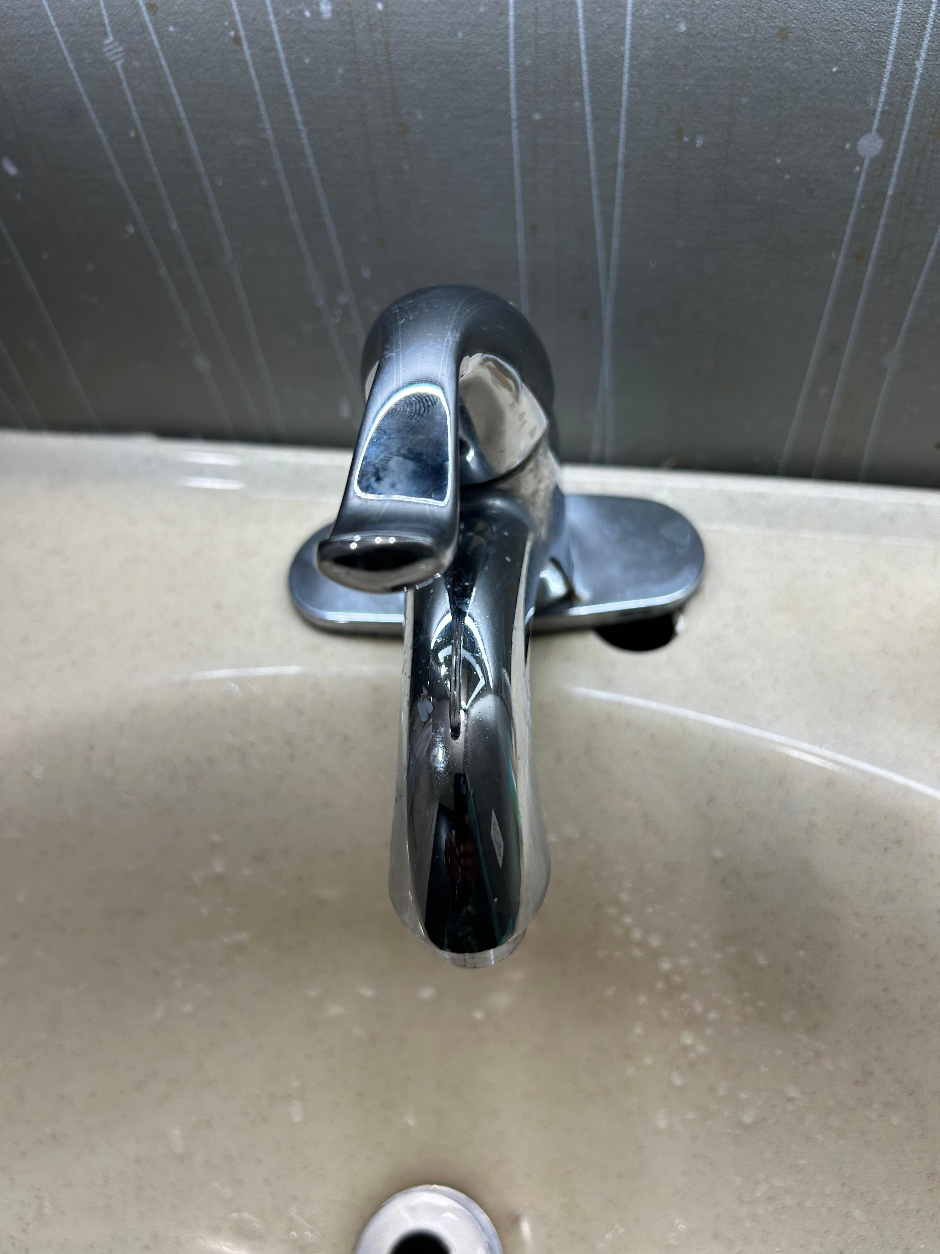 Bathroom Faucet base off the sink - Broken