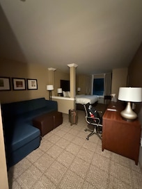 One bed room with couch and desk