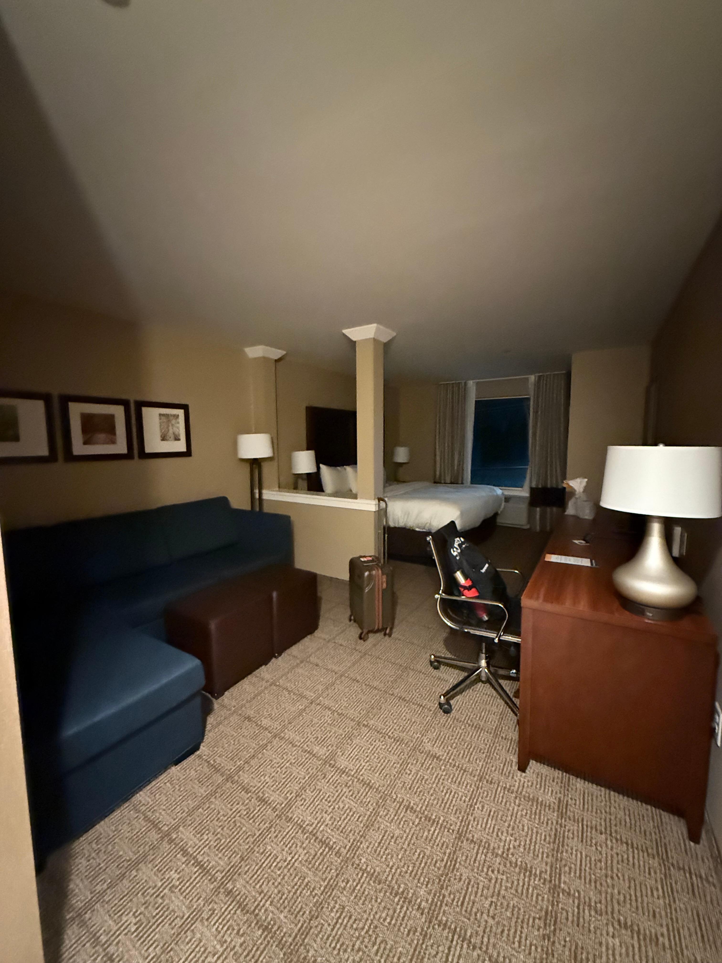 One bed room with couch and desk