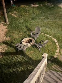 Fire pit (full of stickers and weeds)