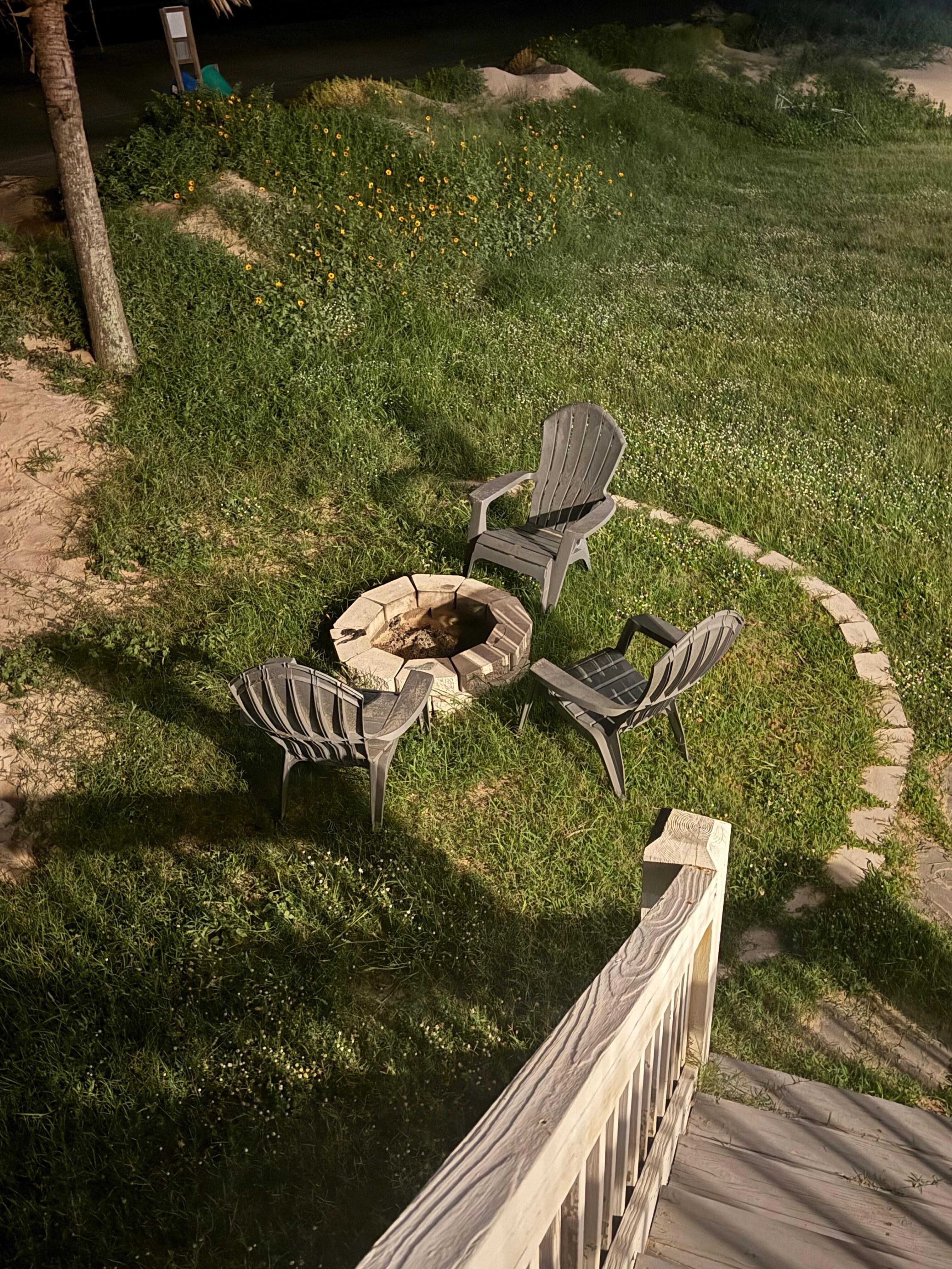 Fire pit (full of stickers and weeds)