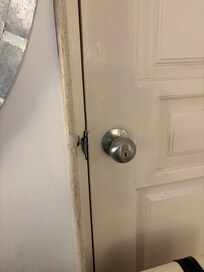 A random door in my room that connects to another room and it looks like it’s been manipulated