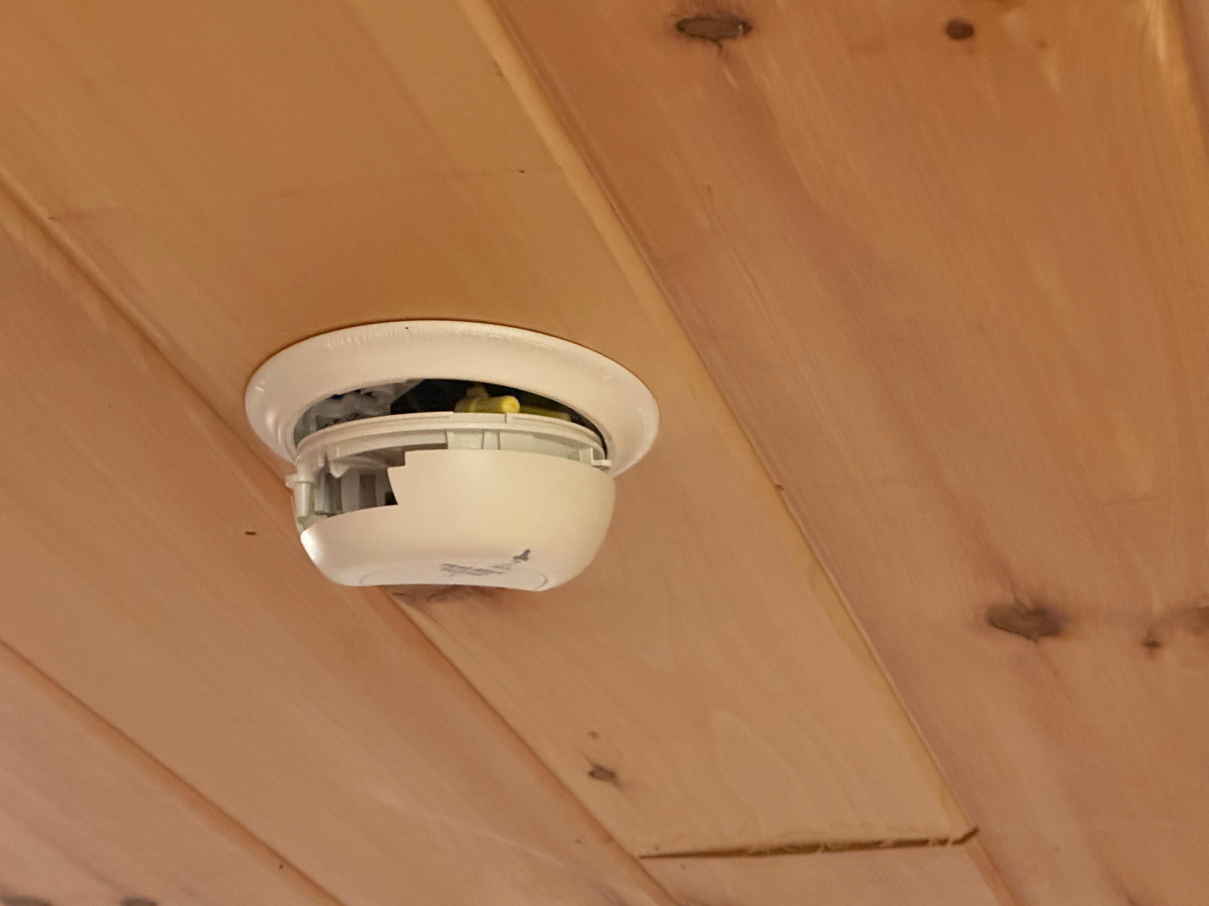Smoke detector hanging down 