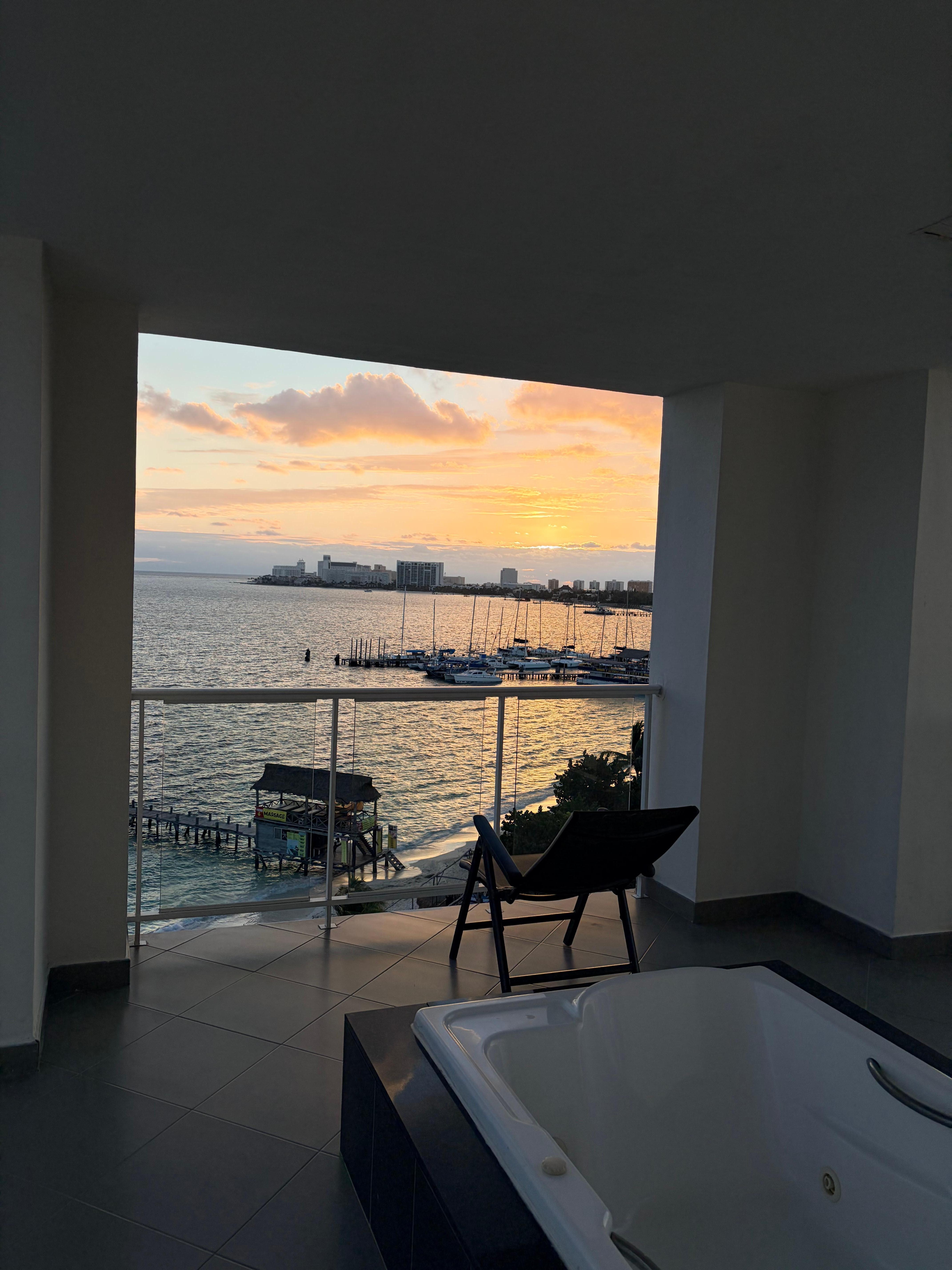 Sunrise. This was a corner room with a jacuzzi inside and on the balcony. 