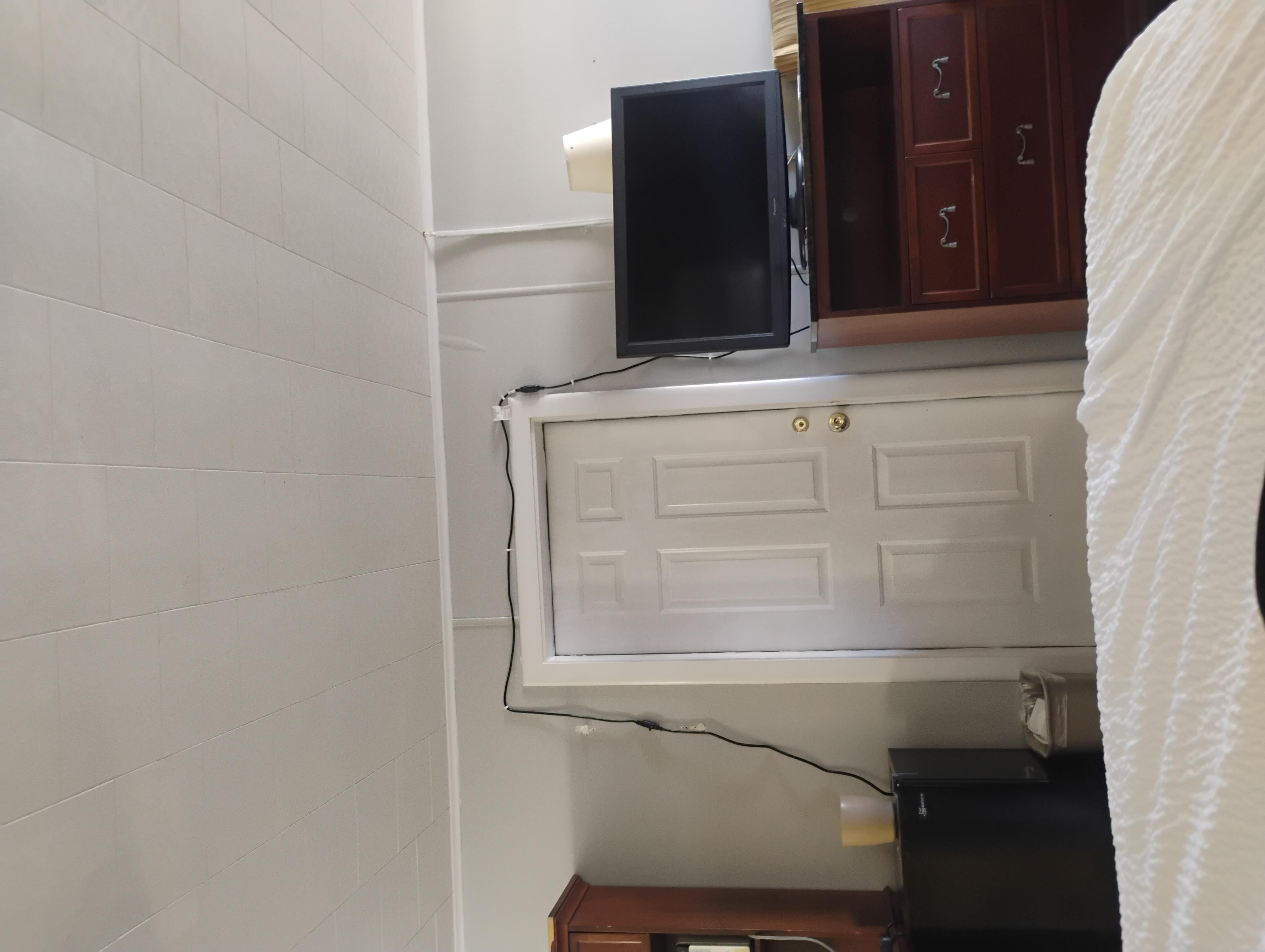 Extension cords over the door to an adjoining room.