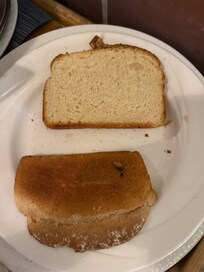 Uncooked toast with butter from room service