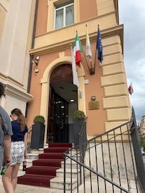 Hotel is next to a church.