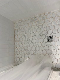 Pink mildew/soap scum in all of the bathrooms