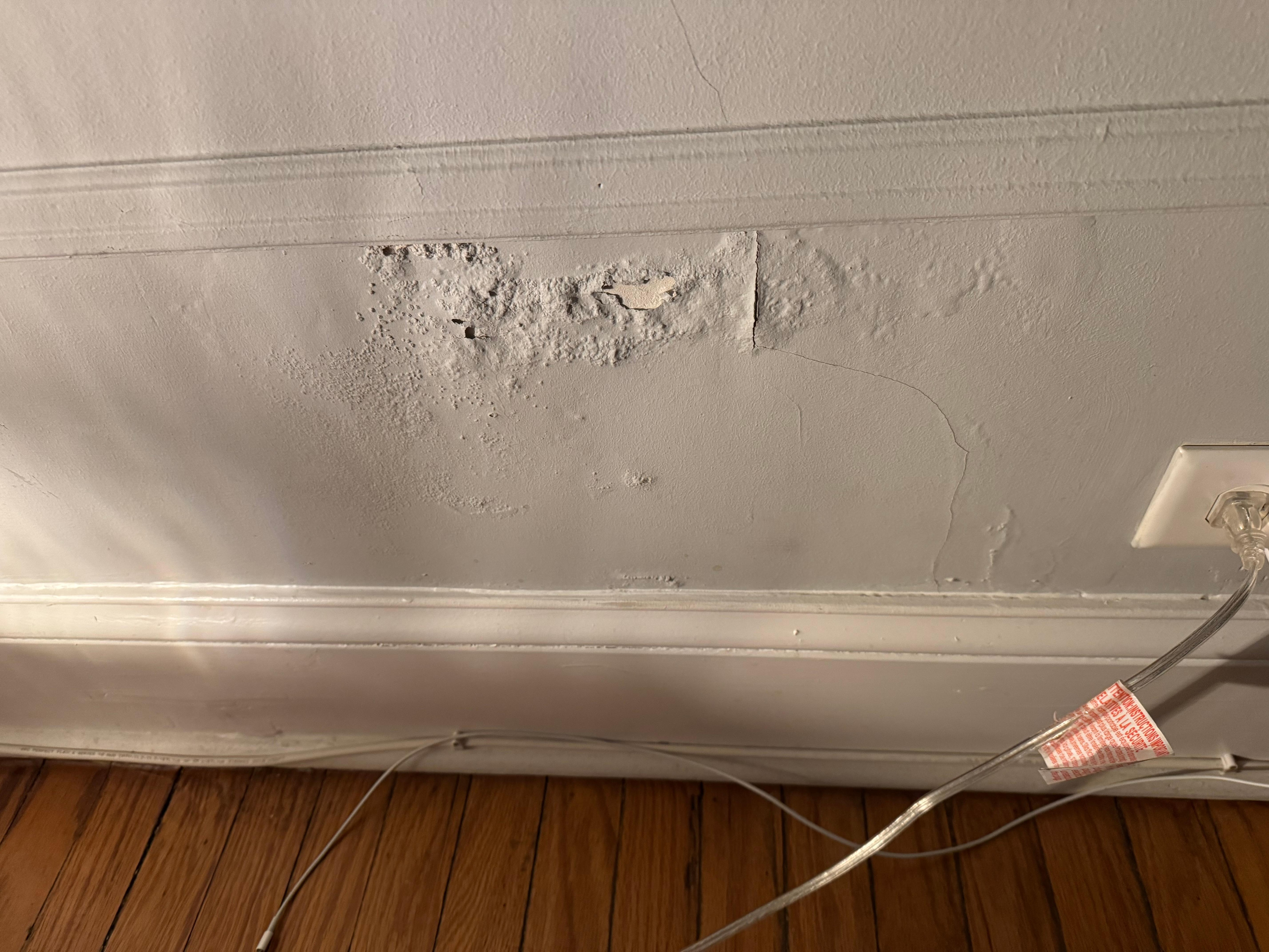 Plaster wall in bedroom