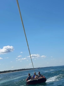 Tubing on Lake Michigan. Water is brisk :) and beautiful.