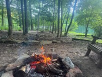 Fire at night by the lake