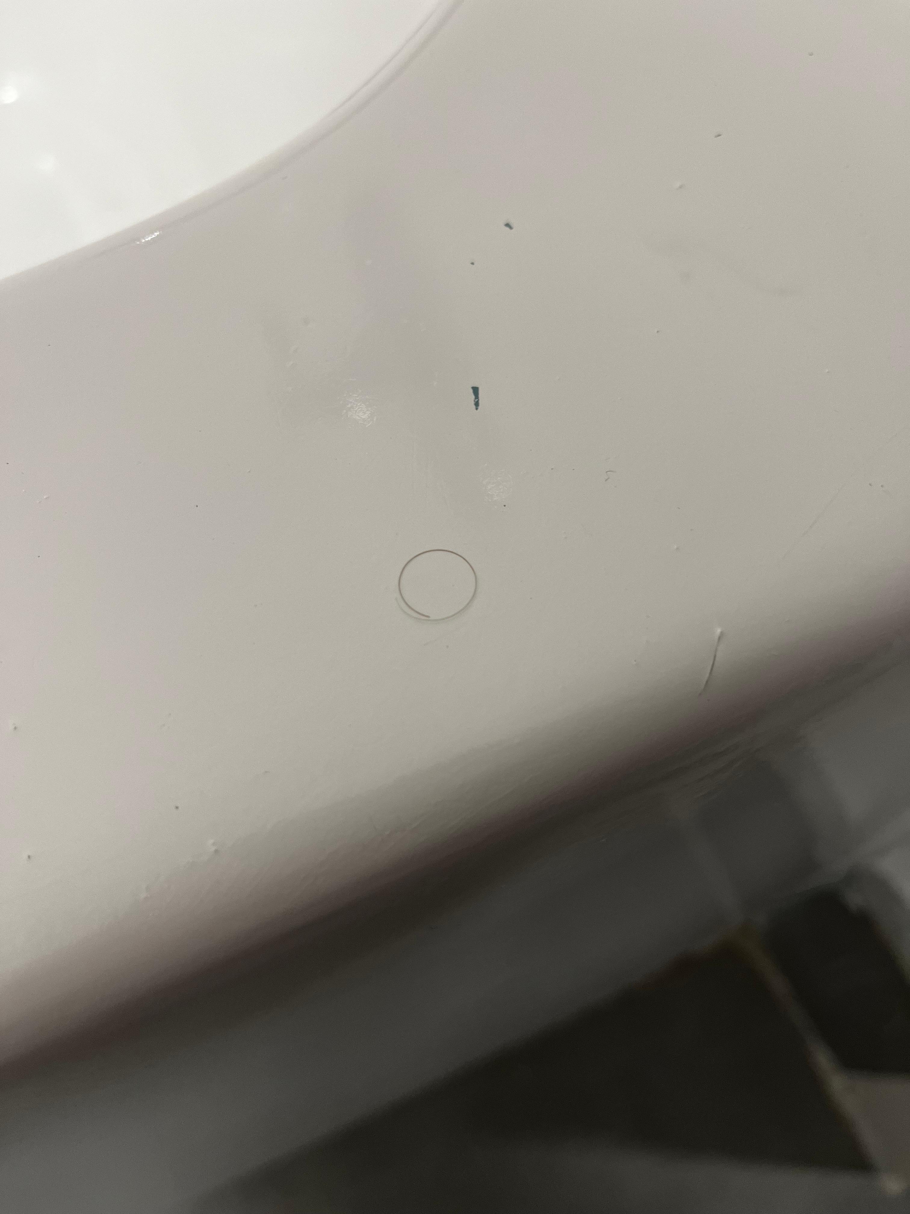 Random hairs (not ours) on sink, in tub and on the floor.