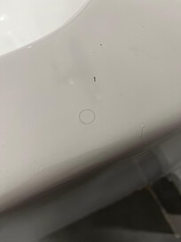 Random hairs (not ours) on sink, in tub and on the floor.