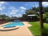 view of pool from the master bedroom