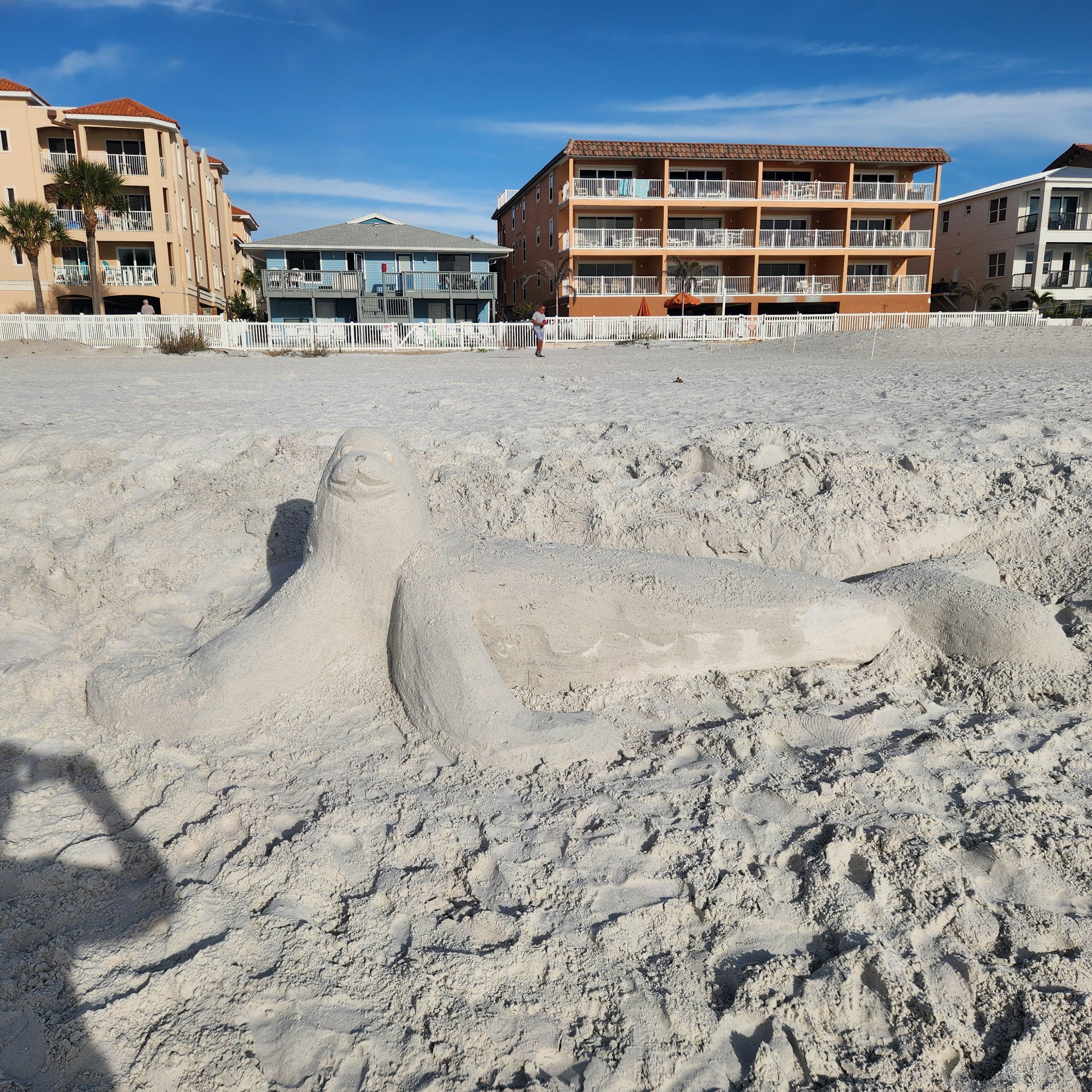 Close walk to water. Condo is the 3-story unit. 