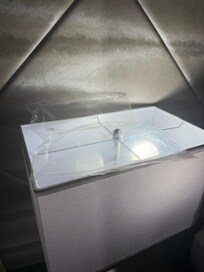 Dirty bag with unknown crystal substance on lampshade