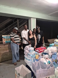 The expecting couple with the soon to be dad's family