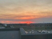 Sunset view of airport from our room