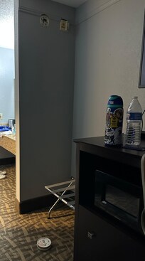 Smoke detector on floor after falling off wall