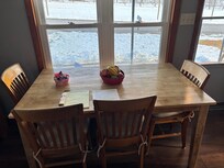 Kitchen table with fresh fruit and local apples. And a bowl of candy!