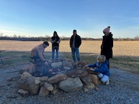 My grandson fire-roasted a rack of lamb on the fire pit for our Christmas Eve dinner.