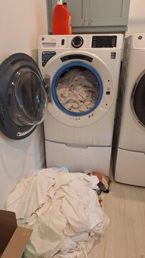Laundry room full of dirty laundry