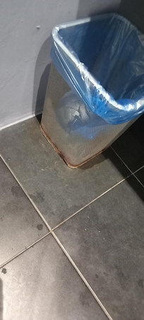 Litter bin in bathroom rusty