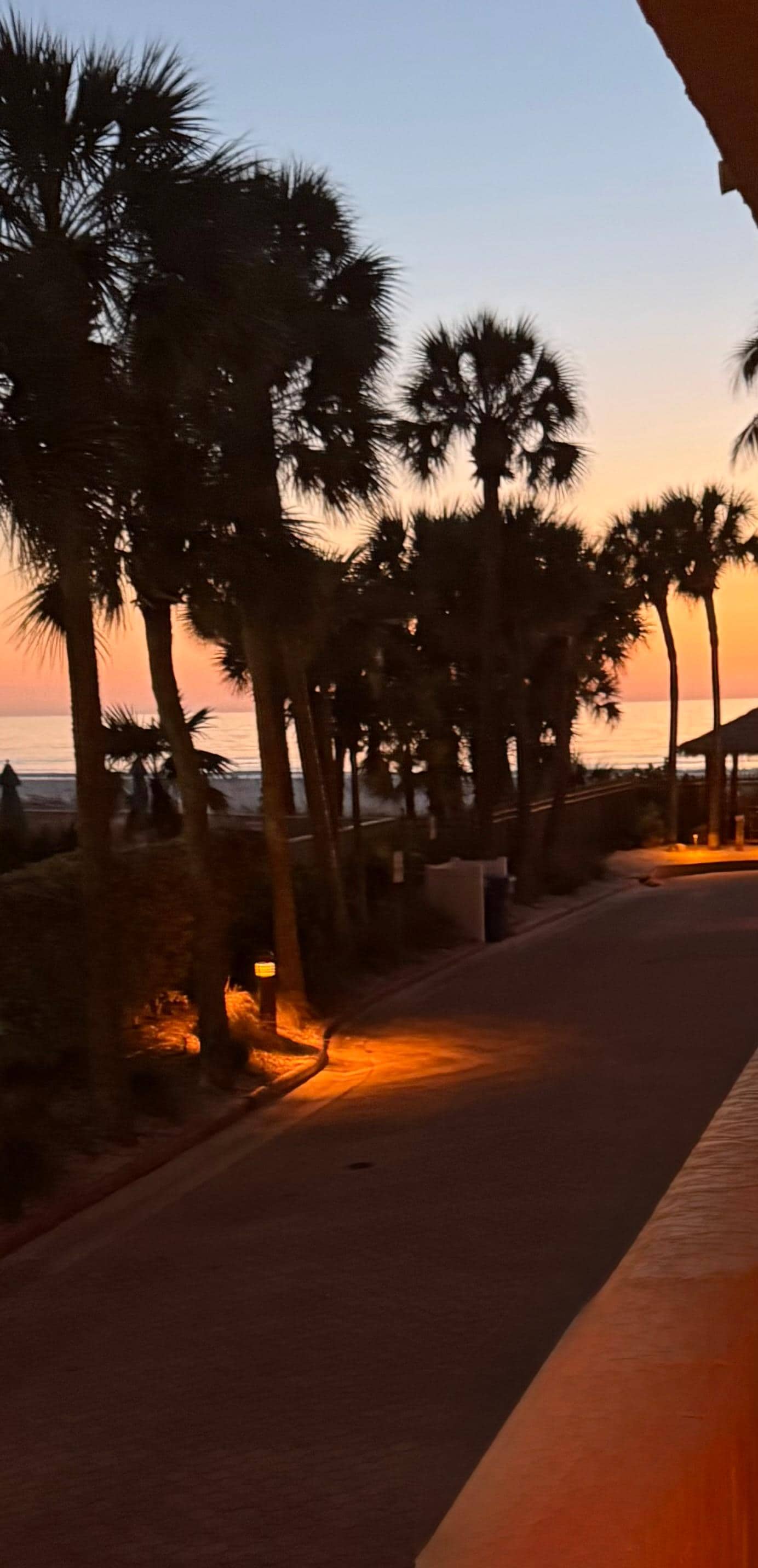 This is how close you are to beach. 
Can see corner of covered grill area to right. 