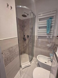Bathroom, small but it works fine. Just if you are a big person or a football player...the shower might be on the smaller size for you.