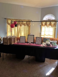 Extra living area- sitting room, was great for our Thank you table& gifts.