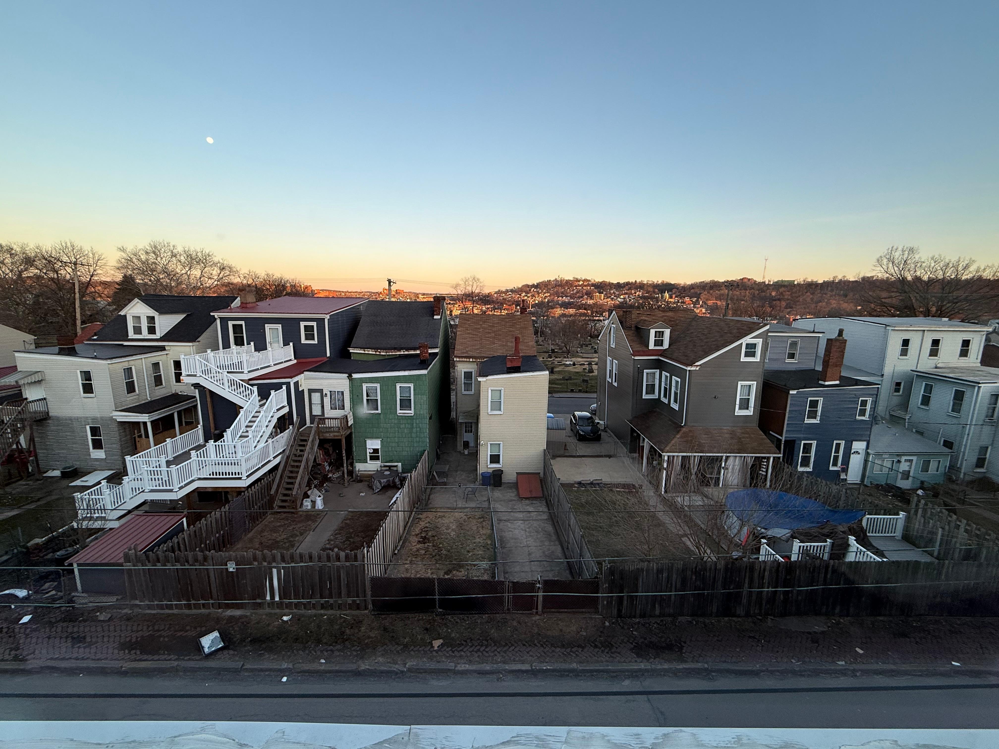 From top floor, front of house.  Cemetery near by.