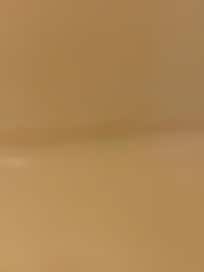 Sides on bathtub with scum build up