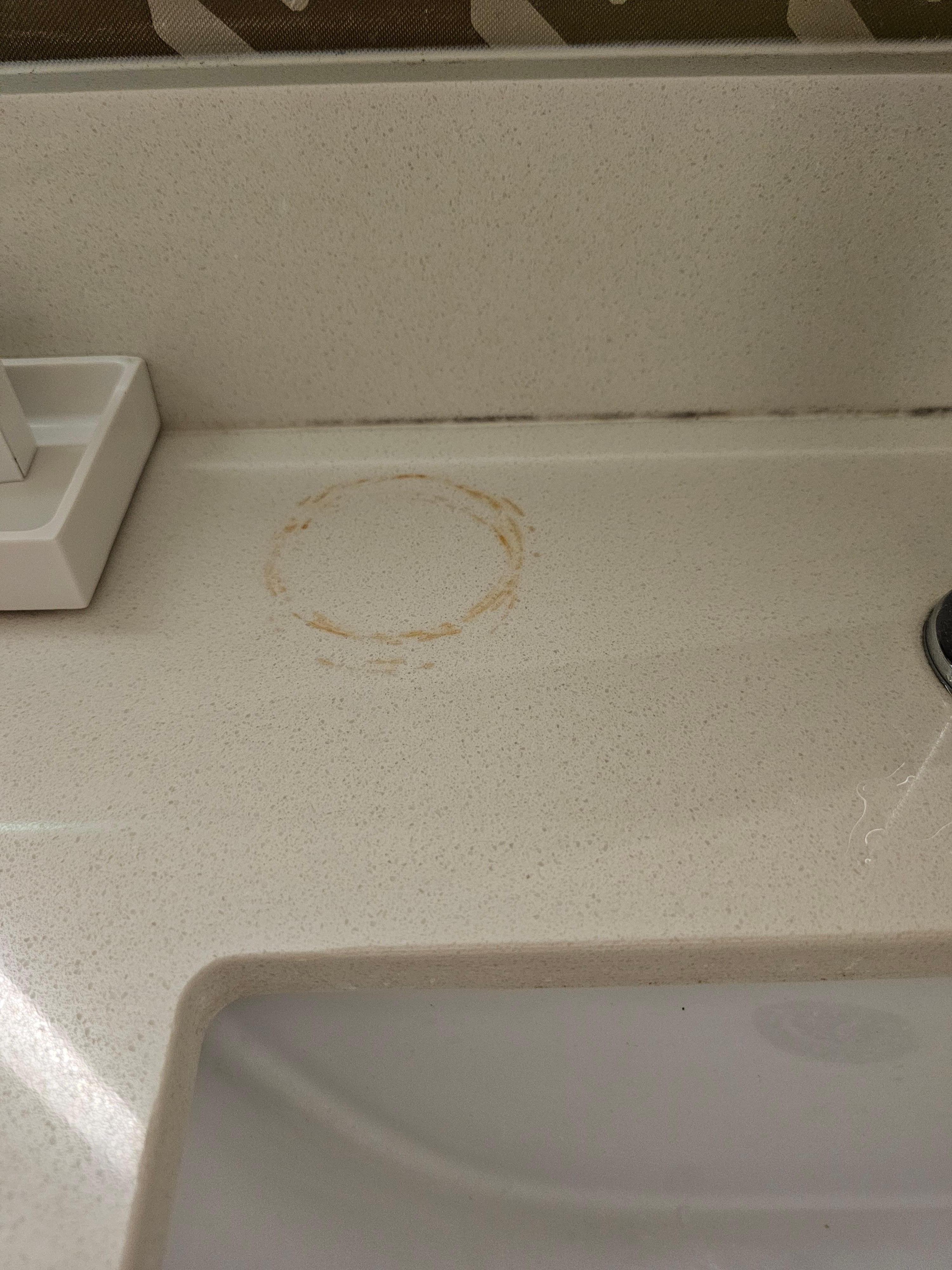 Dirty sink with ring on counter 